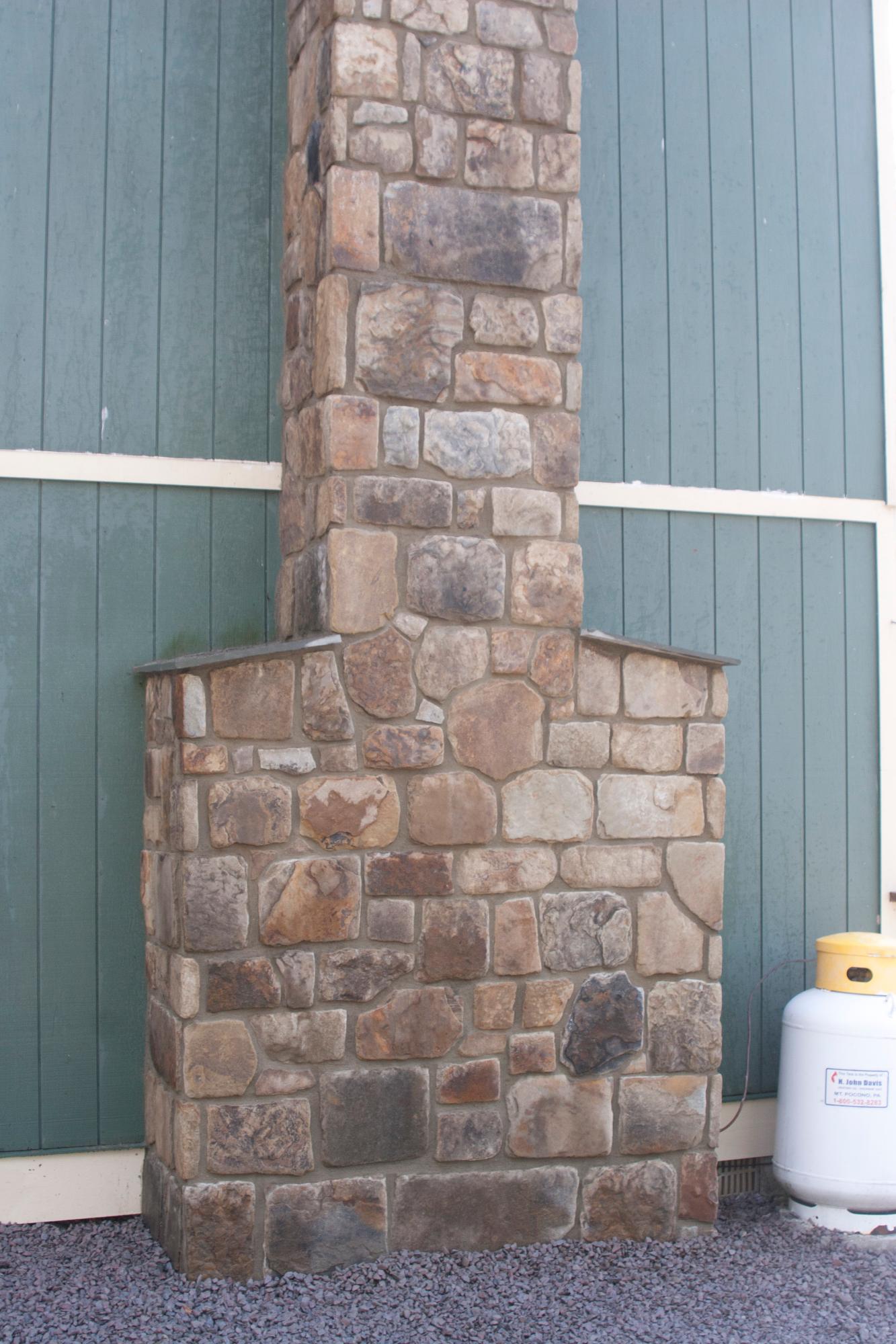 Cut stone chimney